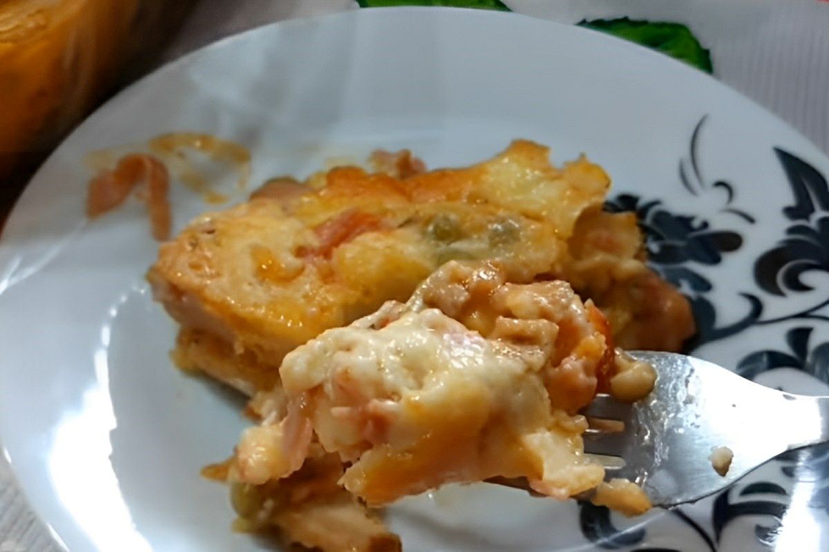 Não gasta quase nada do seu tempo para preparar essa torta de presunto e muçarela