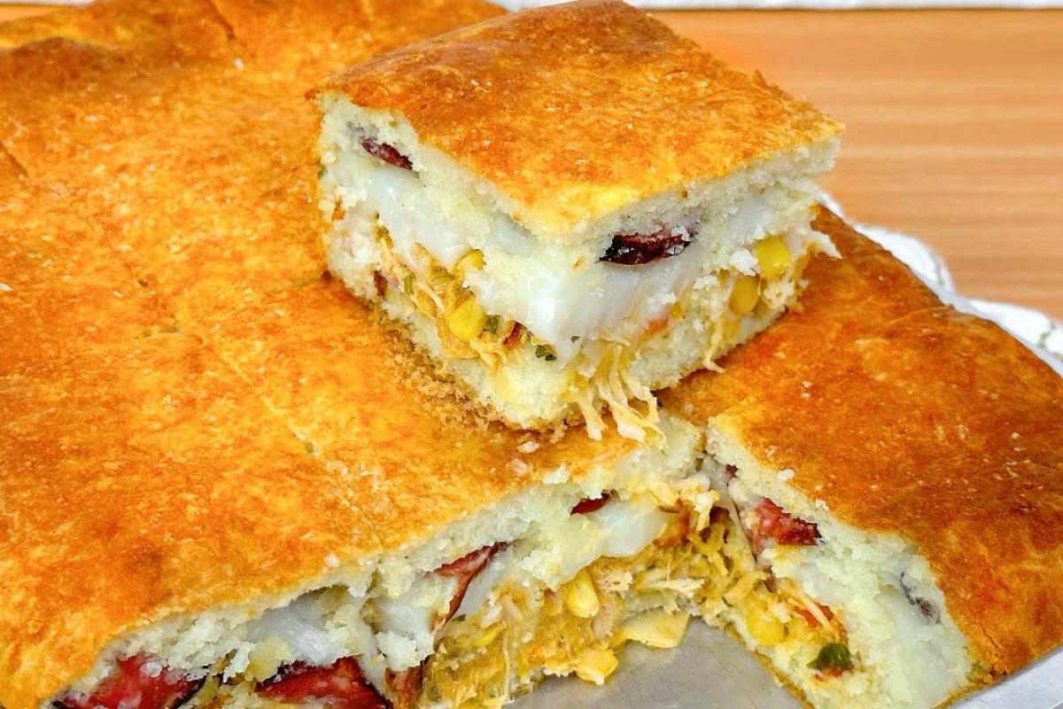 Torta de frango cremosa com aquela massa perfeita que desmancha na boca